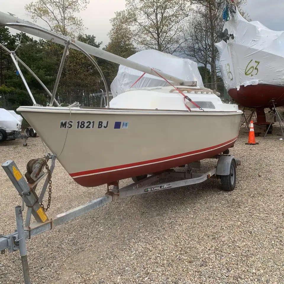 Small sailboat on a trailer in the boatyard