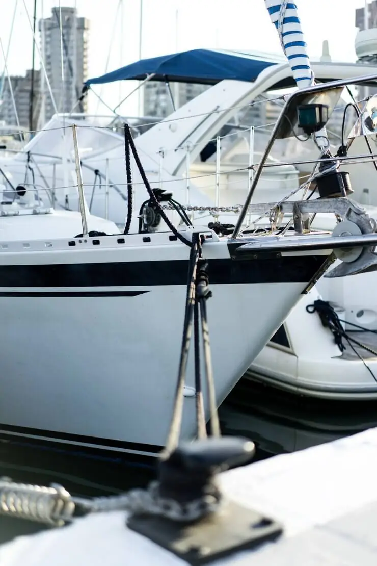 Bow of a powerboat at the dock, ready for hull inspection